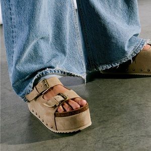 Intentionally Blank Cooper flatform sandals in taupe.